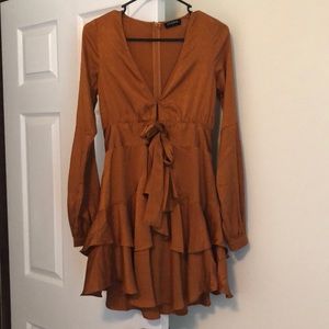 Beautiful deep v cut, long sleeve, flowy dress